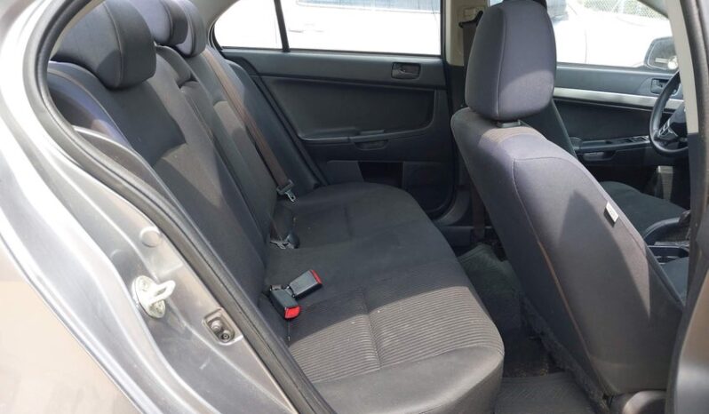 
								2014 Mitsubishi Lancer full									